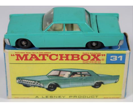 Matchbox Series No.31 Lincoln Continental. An example in sea green with white interior, unpainted base and black plastic whee