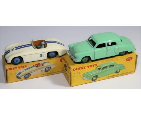 2 Dinky Toys. Cunningham C-5R (133) in white with twin blue racing stripes and mid blue wheels. Plus a Studebaker Land Cruise