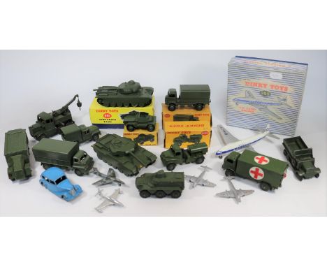 A quantity of boxed and loose Dinky Military toys etc.  Centurion Tank (651). Scout Car (673), Army Water Tanker (643), 3-Ton