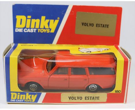 A scarce late Dinky Toys Volvo 265DL Estate (180). An  Italian produced example painted in orange, with a brown interior, bla
