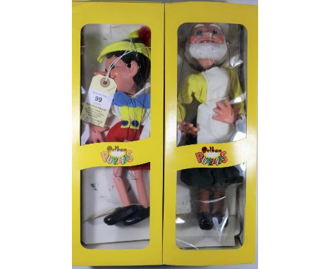 2 Pelham Puppets Walt Disney Characters. Pinocchio (SL7). In yellow, white and red clothing. In a late style window box, mino
