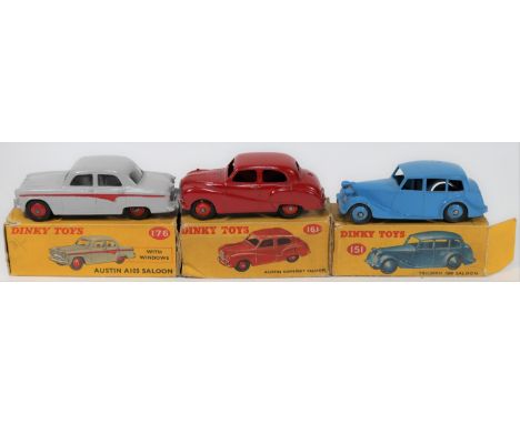 3 Dinky Toys. Triumph 1500 Saloon (151). In mid blue with mid blue wheels. An Austin Somerset Saloon (161) in red with red wh