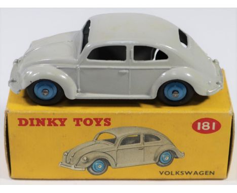 Dinky Toys Volkswagen (181). An example in light grey with mid blue wheels and black tyres. Boxed, minor wear. Vehicle Mint. 