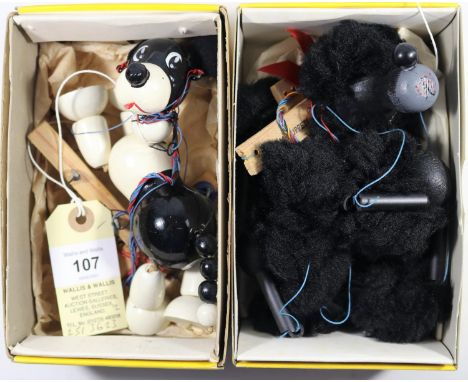 2 Pelham Puppet Animals. 'Wuff' the black and white dog and 'Poodle', with all black fur. Both boxed, minor wear.  Puppets VG