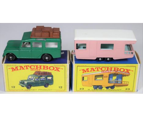 2 Matchbox Series. Safari Land Rover in dark green with white interior, with brown plastic luggage to roof, black plastic whe