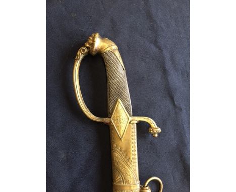 A Naval sword, having curved single edge 84.5cm blade with single fuller, in brass scabbard, overall length 101cm.&nbsp;