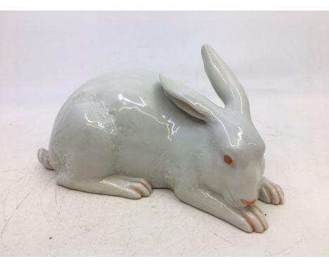 A Kutani Japanese porcelain model of a rabbit, painted character marks, length 18.5cm.   Condition note: in very good all ove