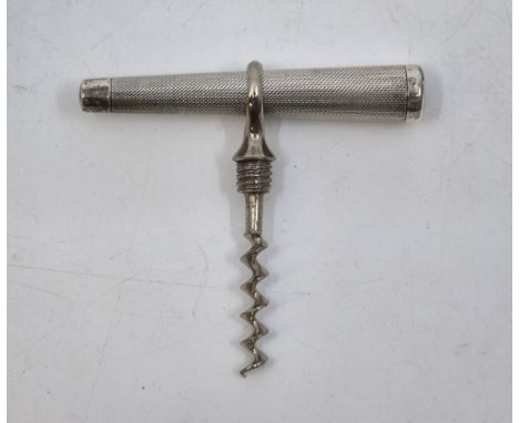 A silver cased travelling pocket corkscrew,&nbsp;Birmingham 1934, makers mark rubbed, with tapering engine turned case unscre