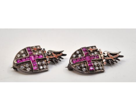 Two silver, CZ, synthetic ruby and red enamel City of London brooches,&nbsp;one by Toye, Kenning &amp; Spencer, London 2000, 