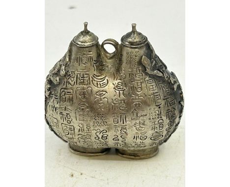 A 19th cent Chinese silver snuff bottle decorated with calligraphy