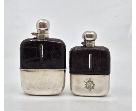 Two early 20th century silver plated crocodile skin mounted glass hip flasks, the smaller by James Dixon &amp; Sons, Sheffiel