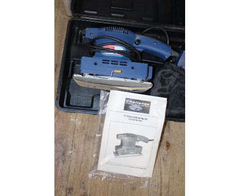 A boxed Orbital sander 