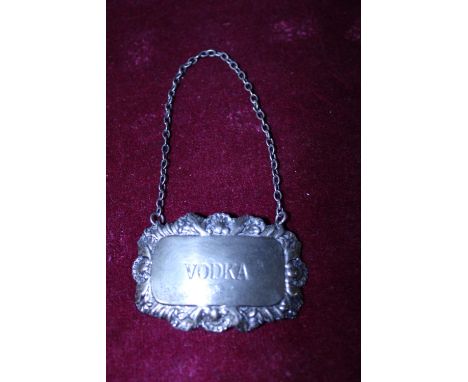A hallmarked silver vodka decanter label Birmingham 1976 
