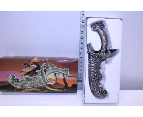 A boxed Fantasy themed dagger and scabbard 