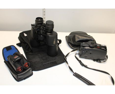 A Minolta camera and two pairs of sports binoculars 