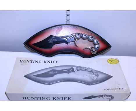 A boxed Fantasy themed hunting knife with wall mount 