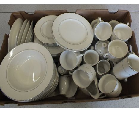 An extensive white porcelain and silver banded dinner and tea set (three boxes)