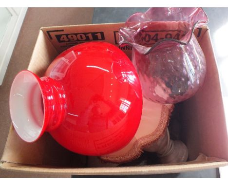 A cranberry oil lamp shade, Onyx table lamp plus lighting accessories