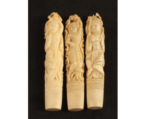 Three vintage Indian Ivory implement handles carved with Hindu Deities