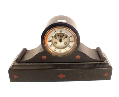 A Victorian black and rose marble striking mantel clock