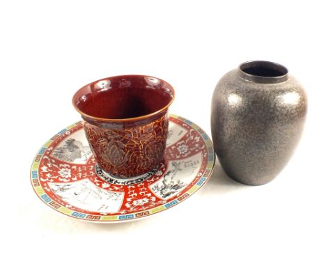 Two Poole pottery vases plus a Chinese style charger