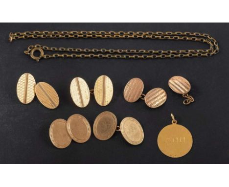 Two pairs of cufflinks and a medallion,: including a pair of 9ct gold, oval cufflinks with engraved border; one and a half 9c