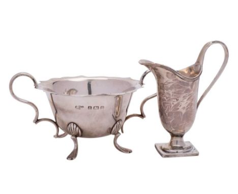 A George V silver sugar basin, maker Joseph Gloster Ltd, Birmingham, 1912: of circular outline with wavy edge border and scro