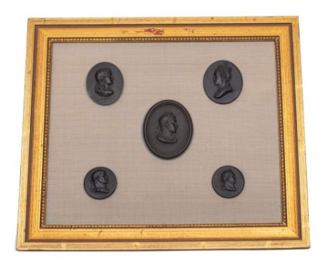 A group of five Wedgwood black basalt portrait medallions: including Emperors of Rome and Virgil, three with impressed upper 