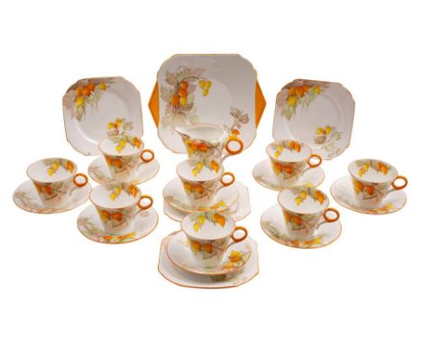 A Shelley porcelain Regent shape part tea service: in the Cape Gooseberry pattern, comprising ten saucers, eight cups, milk j