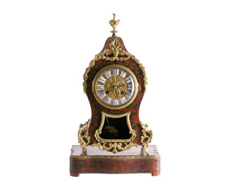 A French boulle mantel clock and stand: the eight-day duration movement striking the hours and half-hours on a bell with the 