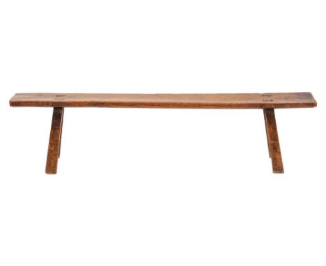 An ash and oak pig bench, late 18th / early 19th century,: the seat on four splayed, straight legs united by simple stretcher