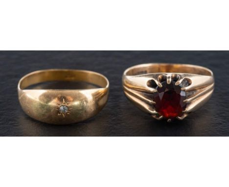 A single-cut diamond ring and a garnet ring,: a ring with estimated diamond weight ca. 0.02ct, stamped '18CT', ring size R, w