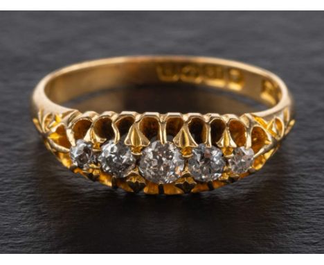 An 18ct gold, old-cut diamond, five-stone ring,: estimated total diamond weight ca. 0.30ct, I-J colour, P1-2 clarity, with ha