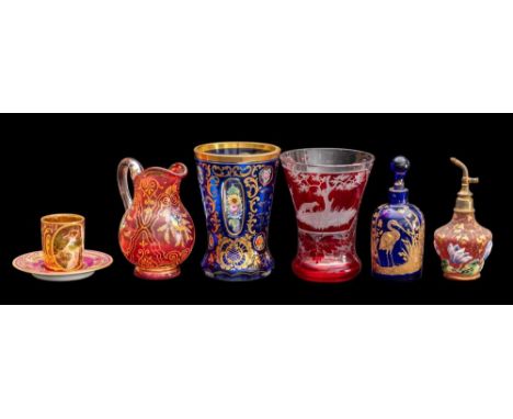 A mixed lot of Bohemian and other glass, late 19th/20th century: including an engraved ruby flashed beaker [rim chip]; an ena