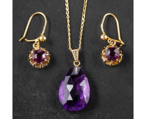 A briolette-cut amethyst pendant,: the pendant stamped '14K', length ca. 2.4cm; a 9ct gold trace-link chain, length ca. 46cm,