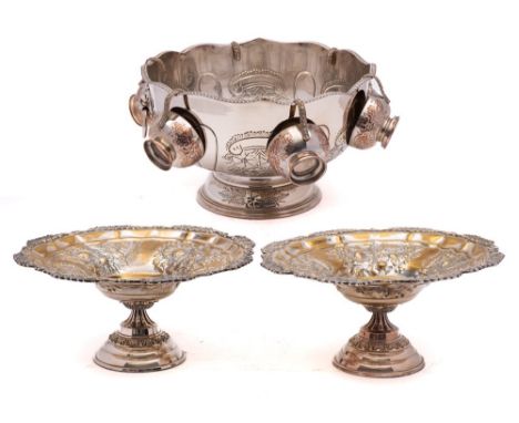 A 20th century silver plated pedestal  punch bowl: of circular outline with gadrooned border, incised foliate and scroll deco