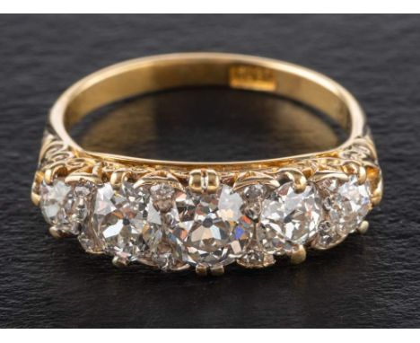 A cushion and old-cut diamond, five stone ring,: estimated total diamond weight ca. 2.30cts, H-I colour, SI1-2 clarity, stamp