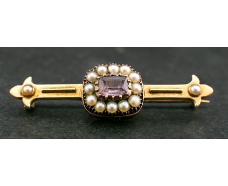 An amethyst and seed pearl bar brooch,: length of brooch ca. 4.6cm, total weight ca. 5.6gms. 