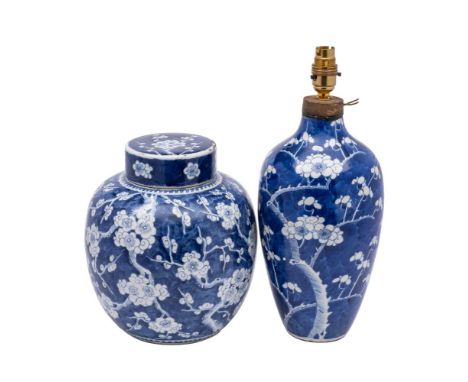 A Chinese blue and white prunus pattern jar and cover and a similar vase: the jar with double circle mark, Qing dynasty, 25cm
