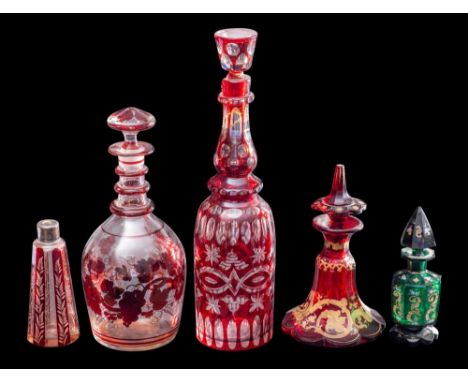 A mixed lot of Bohemian ruby and green glass: comprising a decorated green glass octagonal scent bottle and stopper,14cm; a s
