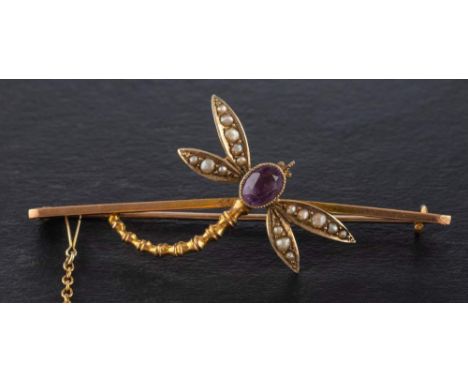 A Victorian, amethyst and seed pearl dragonfly bar brooch,: stamped '9C', length ca. 6cm, total weight ca. 4.6gms, accompanie
