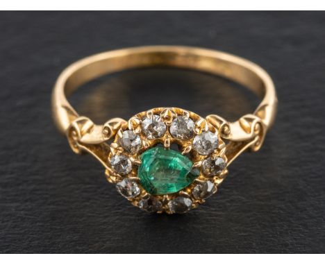 An 18ct gold, pear-shaped, mixed-cut emerald and old-cut diamond cluster ring,: estimated emerald weight ca. 0.30cts, estimat