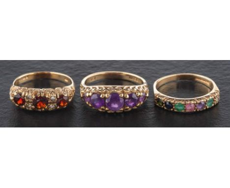 Three 9ct gold gemset rings,: including a vari-gemset 'DEAREST' ring; a five-stone amethyst ring and a three-stone garnet rin