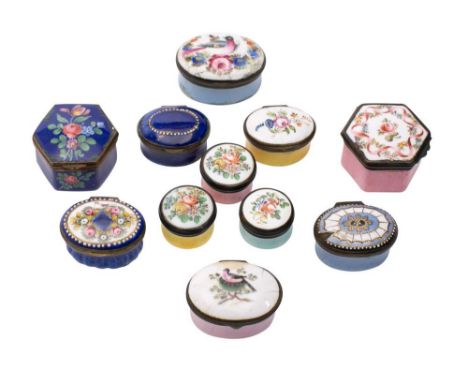 A group of eleven late 18th/early 19th century enamel patch and snuff boxes: the covers decorated with birds, flowers, fan an