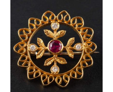 An 18ct. gold, ruby and round, brilliant-cut diamond circular, openwork brooch,: estimated ruby weight ca. 0.20ct, estimated 
