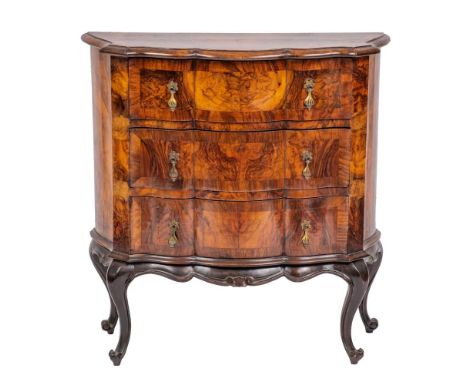 A walnut and crossbanded serpentine front commode in Dutch 18th century taste, early 20th century,: the top with ovolo moulde
