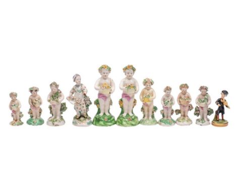 A group of ten Derby figures of putti and a similar figure of Dr.Sintax: all of traditional form holding baskets and garlands