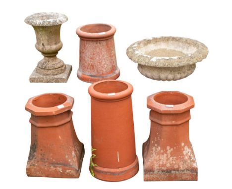 Four Victorian terracotta chimney pots, late 19th century,: comprising a pair of octagonal section, 47cm high; and two cylind