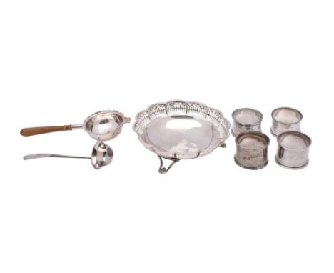 A mixed lot of silverwares, various makers and dates: includes, four napkin rings, a bon bon dish 13cm diameter, a sauce ladl