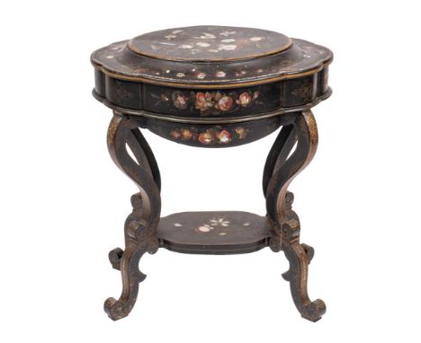 A Victorian black lacquered, painted and mother-of-pearl inlaid work table, circa 1860,: of shaped oval section, the hinged c